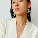 Bow Dance Metal Lava Long Pearl Earrings gembea jewelry