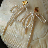 Bow Dance Metal Lava Long Pearl Earrings gembea jewelry