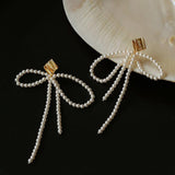 Bow Dance Metal Lava Long Pearl Earrings gembea jewelry