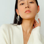 Bow Dance Metal Lava Long Pearl Earrings gembea jewelry