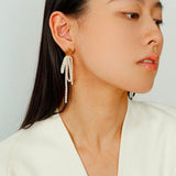 Bow Dance Metal Lava Long Pearl Earrings gembea jewelry