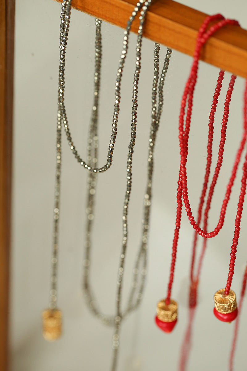 Golden Rotating Wheel Gold Ore Ruby Long Necklace gembea jewelry