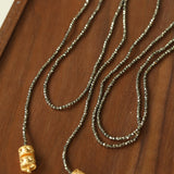 Golden Rotating Wheel Gold Ore Ruby Long Necklace gembea jewelry