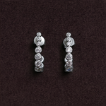 Lueur Bubble Curve Cubic Zircon Earrings-Silver gembea jewelry