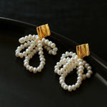 Metal Lava Petite Bow Pearl Earrings gembea jewelry