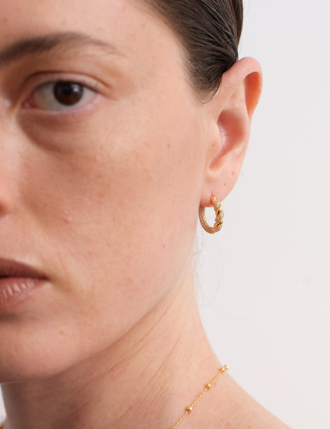 Twist Radiance Mini Hoop Earrings-Gold gembea jewelry