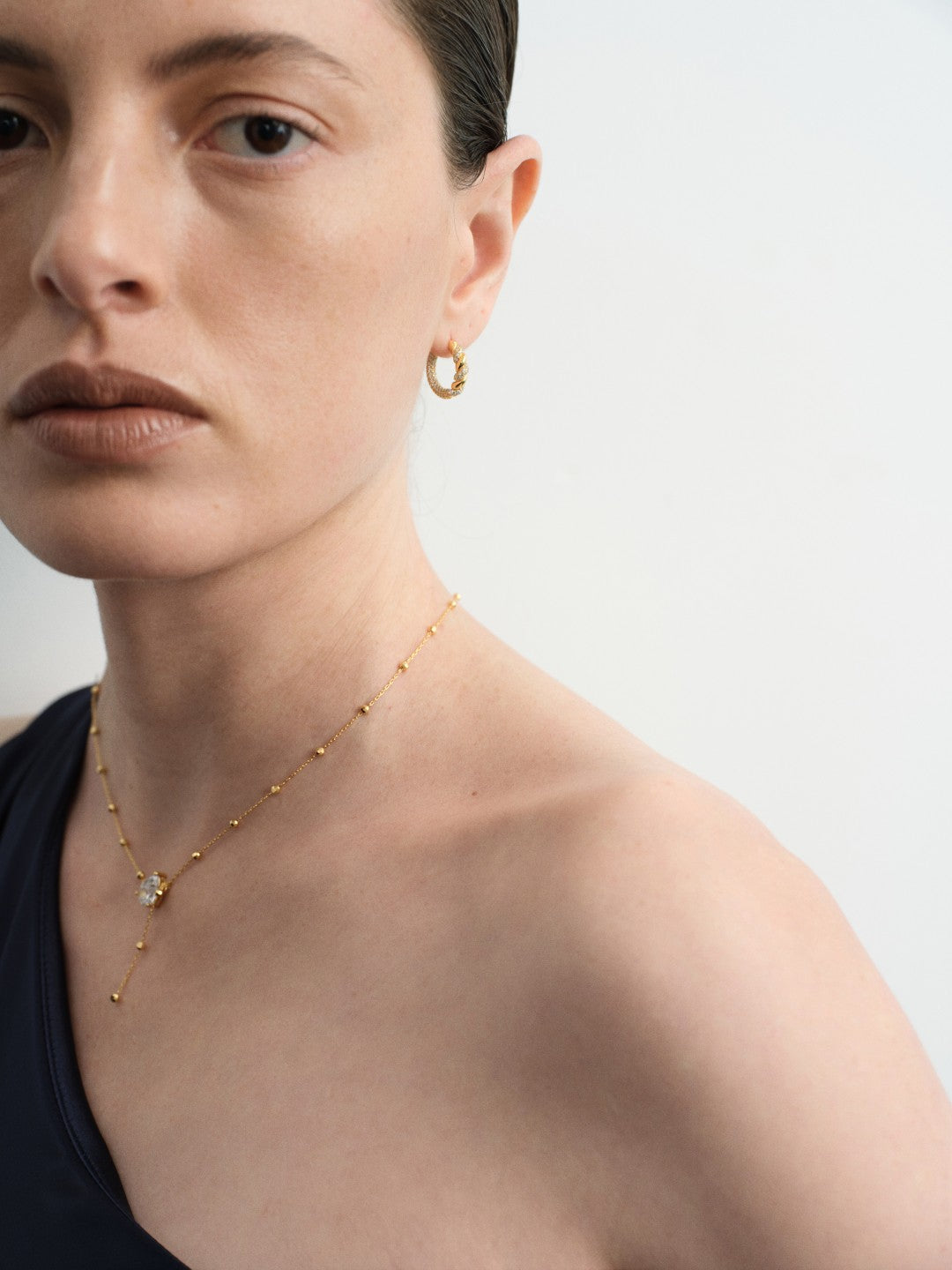 Twist Radiance Mini Hoop Earrings-Gold gembea jewelry