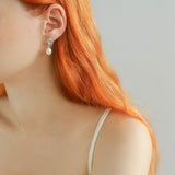 Metallic Conch Pearl Statement Drop Earrings gembea jewelry