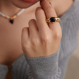 Gembea Jewelry Hollowed-Out Metal Black Agate Set Ring
